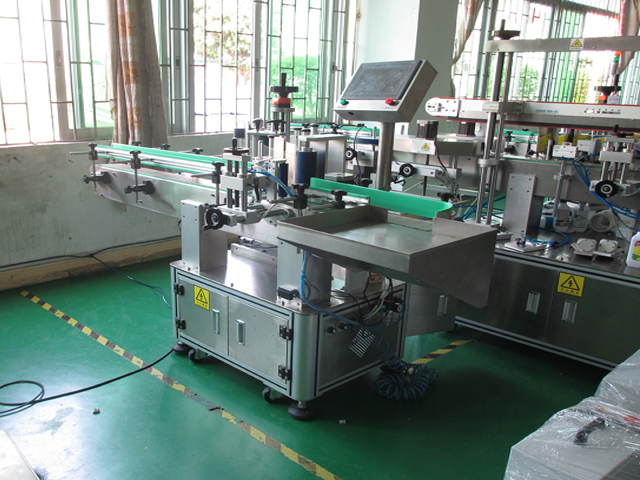 round bottle labeler Flaschen Etikettiermaschine 丸缶ラベル貼付機 ETIKETTIERMASCHINE.jpg