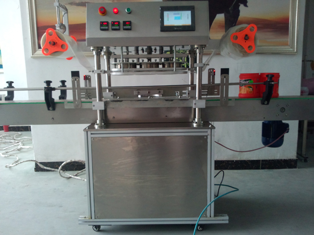 automatic three heads jars sealing equipment 瓶の密封機.jpg