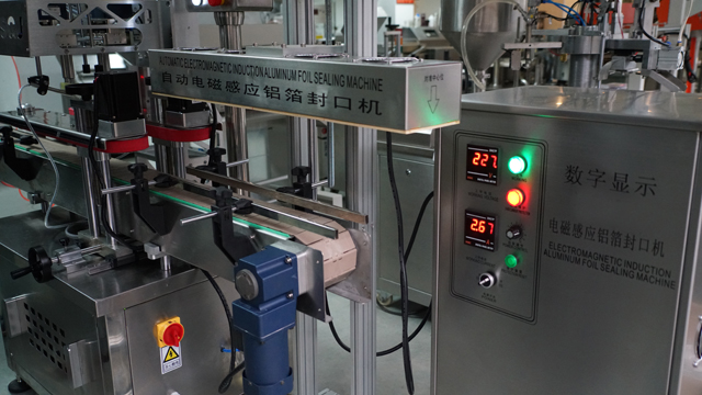 aluminum induction foil sealing machine シーリングマシン自動.jpg