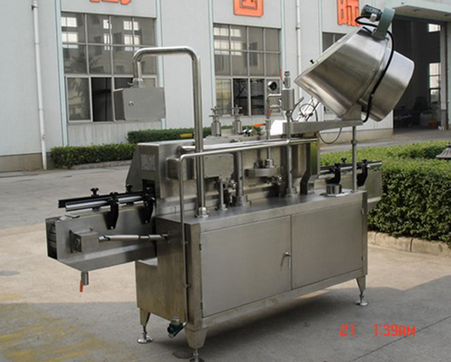PLC-controlled system glass Jar twist off Steam Capper equipment vacuum capping machine for Glass Jars ツイストオフ式真空キャップの背面ショット.jpg