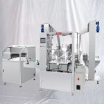 液体小瓶充填キャッピングラベリングマシン（アンスクランブラー付き）