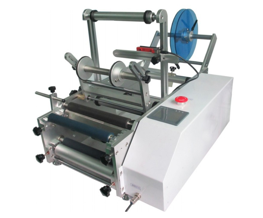 pharmaceutical equipment labeling machine for syringes 丸ボトルラベル貼り機.jpg